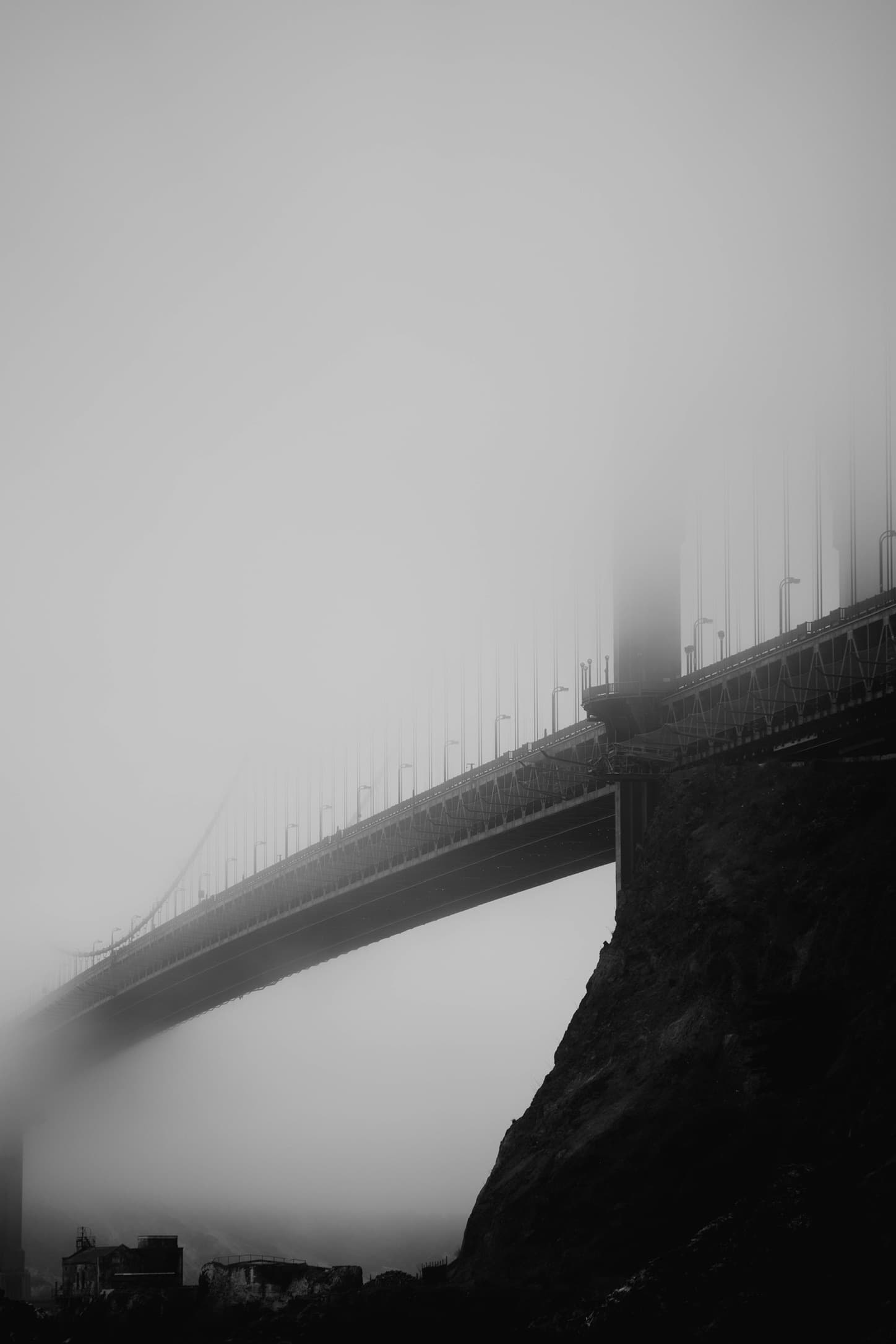 Golden Gate Bridge disappearing into fog